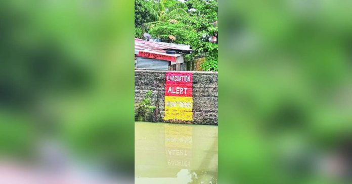 The community-based flood early warning system’s tri-color includes yellow for monitoring, orange for alert and red for evacuation. BACOLOD CDRRMO PHOTO