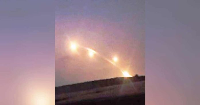 This photo is a grab from a video footage filmed by a resident of Shlomi in northern Israel. It appears to show rockets from Lebanon being intercepted by Israel. BBC