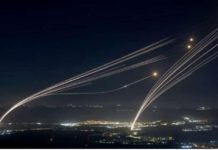 Projectiles fired from the Israeli Iron Dome air defense system intercept missiles fired from southern Lebanon, over the upper Galilee, northern Israel, early on August 4, 2024. EPA