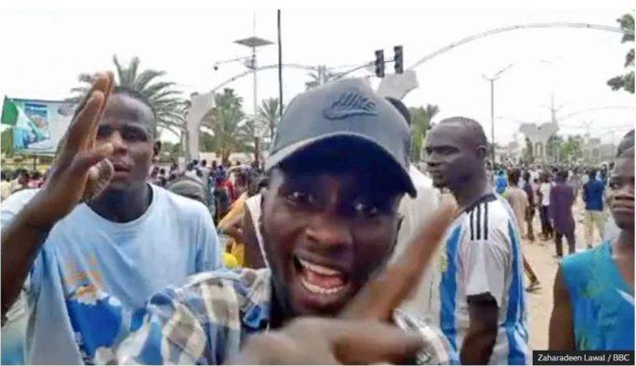 Due to hunger, angry people protest in Kano, Nigeria. ZAHARADEEN LAWAL / BBC