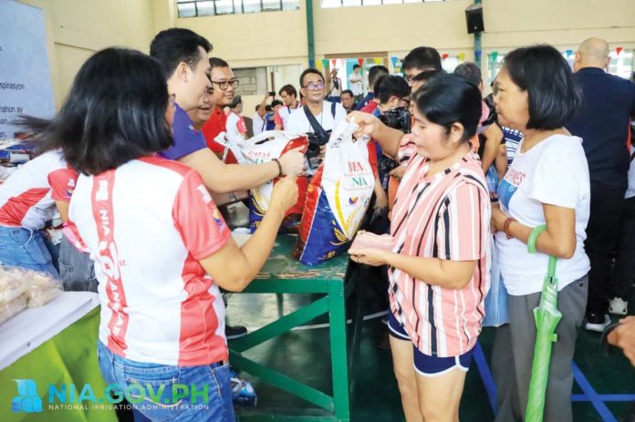 The National Irrigation Administration sold P29 per kilo rice on Thursday, August 8, 2024. Select buyers consisting of 300 residents of barangays Pag-asa, Central and Pinyahan in Quezon City were 4Ps beneficiaries, elderly, solo parents, and persons with special needs. NATIONAL IRRIGATION ADMINISTRATION PHOTO