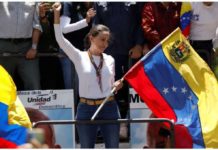 Opposition leader Maria Corina Machado addresses supporters in Caracas, Venezuela. REUTERS