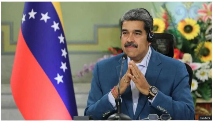 Venezuela's President Nicolas Maduro smiles during an event, in Caracas, Venezuela. He maintains he has been re-elected to a third term, but the opposition says it has evidence showing it won the election. REUTERS