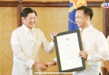 President Ferdinand “Bongbong” Marcos Jr. confer the 2022 Lone Presidential Gawad Career Executive Service award to Dr. Miguel Mac D. Aposin (right), superintendent of the Schools Division Office of Capiz. SCREENGRABED FROM PRESIDENTIAL COMMUNICATIONS OFFICE FACEBOOK LIVE