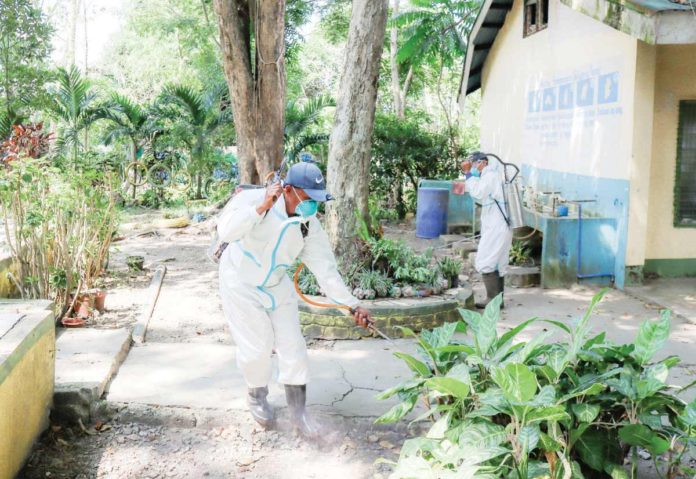 The local government of Anilao in Iloilo conducts misting in schools to prevent the spread of dengue. As of August 10, the town has recorded 58 dengue cases. LEE ANN DEBUQUE/FACEBOOK PHOTO