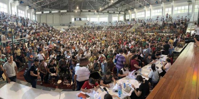 Beneficiaries gathered at Bacolod City College’s Activity Center in Bacolod City on August 16, 2024 for the release of cash assistance from the Department of Social Welfare and Development. The payout was very slow and disorganized.