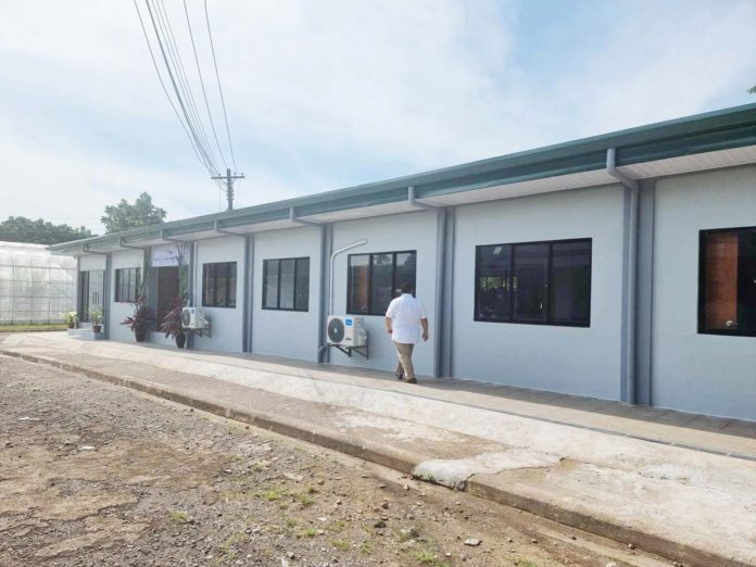 Sugar Regulatory Administration Board Member Dave Sanson inspects the newly constructed P6-million beneficial micro-organisms laboratory. SRA PHOTO