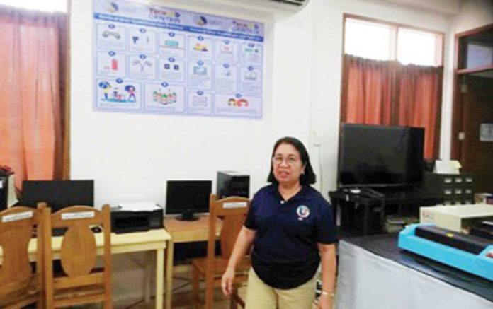 Antique Provincial Librarian Grace Magullado prepares for the setting up of a hub for the Technology for Education, Employment, Entrepreneurs and Economic Development program at the provincial library at the old capitol in San Jose de Buenavista town on Monday, Sept. 23, 2024. PNA PHOTO BY ANNABEL CONSUELO J. PETINGLAY