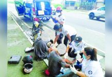 Personnel of the Bacolod City Disaster Risk Reduction and Management Office applied first aid to three victims of a motorcycle accident in the city’s circumferential road on Sept. 1, 2024. BACOLOD CITY DRRMO PHOTO