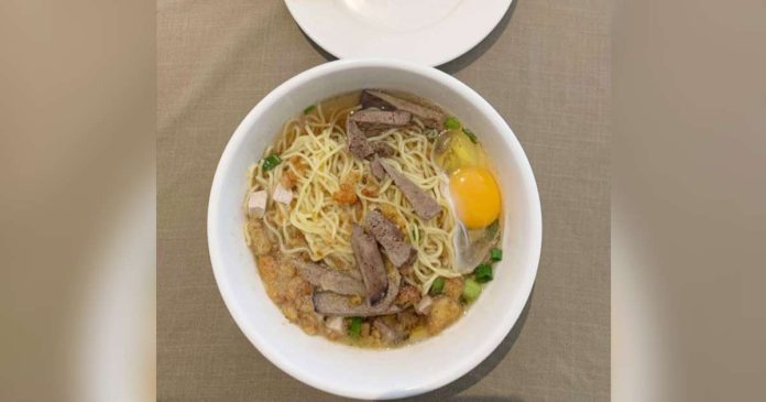 Batchoy, an iconic culinary staple of Iloilo, is known for its rich broth infused with noodles, beef stock, crushed pork cracklings, and innards. JERRY TREÑAS/FACEBOOK PHOTO