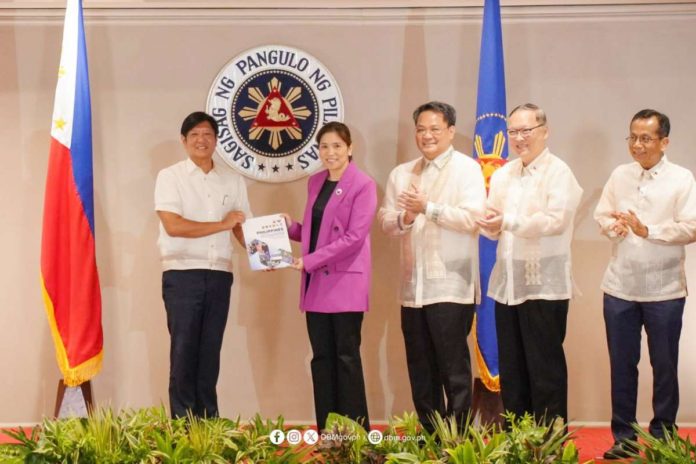 Department of Budget and Management Secretary and Public Financial Management (PFM) Committee Chairperson Amenah F. Pangandaman (second from left) leads the ceremonial endorsement of the PFM Reforms Roadmap 2024-2028 to President Ferdinand R. Marcos Jr. (left)on Tuesday, Sept. 17, 2024. DBM PHOTO