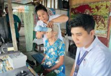 Registration Center Supervisor Jeza Nadales (left) and Registration Kit Operator Vergel Sangco (right) conduct house-to-house mobile registration in Barangay Lawi, Jordan, Guimaras on July 31, 2024. PSA-GUIMARAS PHOTO