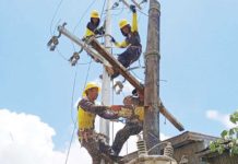 The Iloilo Electric Cooperative 1, Inc. (ILECO 1) explained that the major factor that caused the increase in the electric bills for July and August this year was the National Grid Corp. of the Philippines’ line rental increase. Photo shows ILECO 1 personnel doing maintenance work. ILECO 1 FILE PHOTO