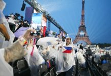 The mounting of direct Manila-Paris flights starting December 8, 2024 would enhance ease of travel and provide the much-needed connectivity to Europe. Photo shows attendees posing with a Philippine flag in the stands at the Trocadero during the opening ceremony of the Paris 2024 Olympic Games in Paris, France on July 26, 2024, with the Eiffel Tower in the background. OLI SCARFF, AFP