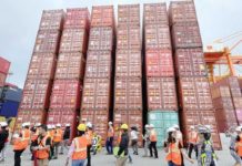 Almost half a million sacks of rice in more than 800 shipping containers remain uncollected at the Manila International Container port. JERVIS MANAHAN, ABS-CBN NEWS/PHOTO