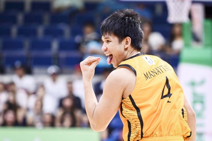 Capiznon Christian Manaytay of University of Santo Tomas Growling Tigers gestures after scoring against University of the East Red Warriors. UAAP PHOTO