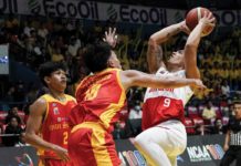 Ilonggo John Bryan Sajonia of San Beda University Red Lions attacks two San Sebastian College Golden Stags’ defenders. PHOTO COURTESY OF NCAA/GMA SPORTS