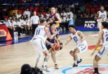 Rain or Shine Elasto Painters’ Adrian Nocum protects the ball while being defended by NLEX Road Warriors’ Robbie Herndon and Dominick Fajardo. PBA PHOTO