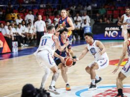 Rain or Shine Elasto Painters’ Adrian Nocum protects the ball while being defended by NLEX Road Warriors’ Robbie Herndon and Dominick Fajardo. PBA PHOTO