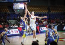 Rain or Shine Elasto Painters’ Adrian Nocum scores against the defense of Magnolia Chicken Timplados Hotshots’ Zavier Lucero. PBA PHOTO