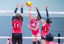 Negrense Erika Jin Deloria of Biñan Tatak Gel 1-Pacman Partylist Volley Angels smashes the ball against two defenders. MPVA PHOTO