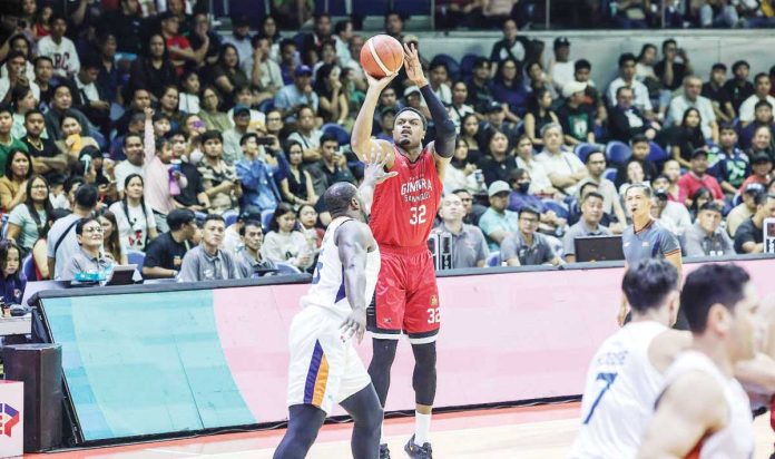 Barangay Ginebra San Miguel Kings’ Justin Brownlee shoots over the defense of Meralco Bolts’ Allen Durham. PBA PHOTO