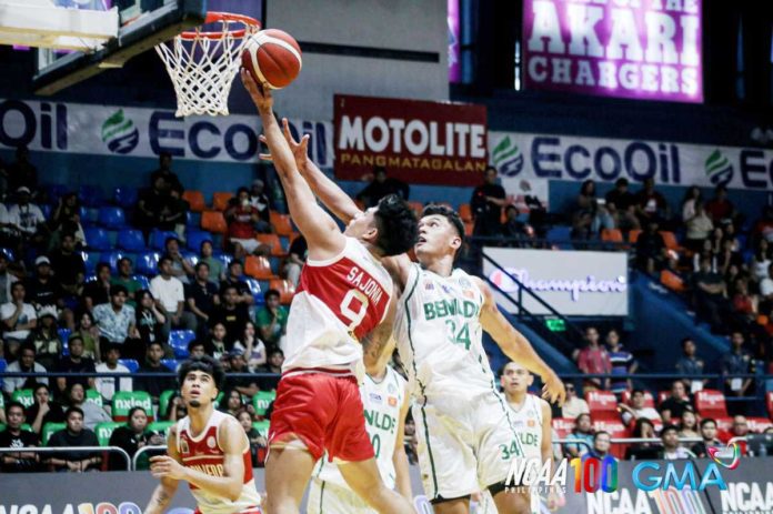 Ilonggo John Bryan Sajonia of San Beda University Red Lions tries to score against the defense of College of St. Benilde Blazers’ Allen Liwag. PHOTO COURTESY OF NCAA/GMA SPORTS