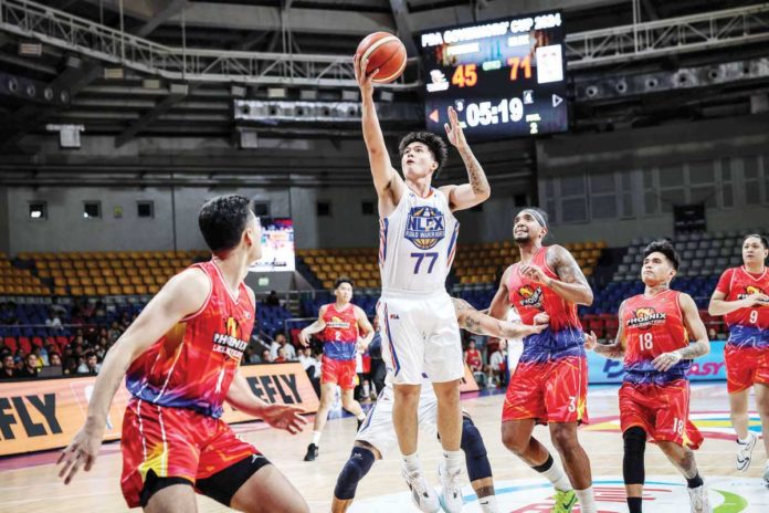 NLEX Road Warriors' Xyrus Torres stretches for a layup. PBA PHOTO