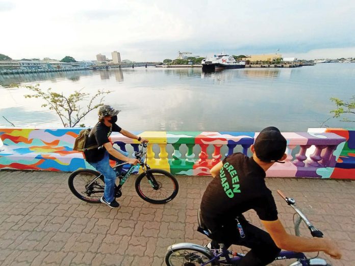 This is the Iloilo River as seen from the Muelle Loney portion of the Iloilo Esplanade. The Iloilo River is an estuarine waterway. It runs through the city, winding its way from the Iloilo Strait in the south and stretching inland. The river is known for its significant environmental, economic, and cultural importance to the city. ILOILO CITY HALL PHOTO