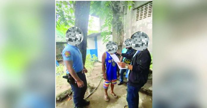 Officers of the Regional Maritime Unit 6 arrested alias “Bebe”, the No. 6 most wanted person in Western Visayas for rape and child abuse, in Barangay Tabigue, EB Magalona, Negros Occidental. RMU-6 PHOTO