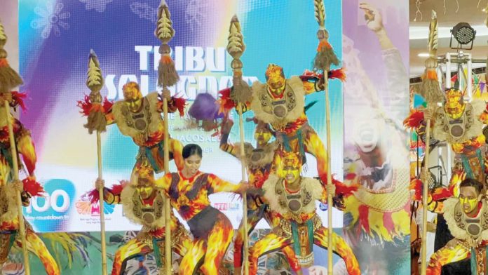 The 100-day countdown to Dinagyang Festival 2025 begins on Friday, October 18. Photo shows the Tribu Salognon of Jaro National High School performing during the launching of the countdown at SM City Iloilo. BOMBO RADYO ILOILO/FACEBOOK PHOTO