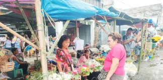 Flower vendors in Iloilo City saw a slight increase of P50 to P100 on select flowers, but they said prices have mostly remained stable. Photo shows flower vendors along Iznart Street in City Proper district. AJ PALCULLO/PN