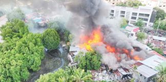 Seventeen houses were destroyed and two others were partially damaged by a fire that hit a congested area in Barangay Magsaysay Village, La Paz, Iloilo City on Monday afternoon, Oct. 14, 2024. SCREENSHOT FROM ILOILO CITY DRRMO FACEBOOK VIDEO