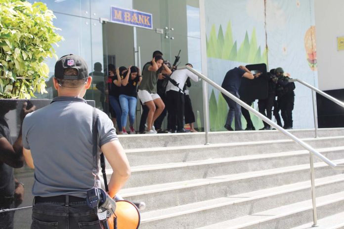 A simulation exercise on hostage-taking situation was conducted at a building on Digital Road in Iloilo Business Park, Mandurriao, Iloilo City. AJ PALCULLO/PN