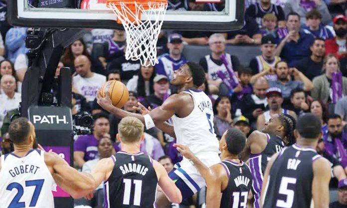 Minnesota Timberwolves’ Anthony Edwards goes for a reverse layup. PHOTO COURTESY OF ATHLON SPORTS