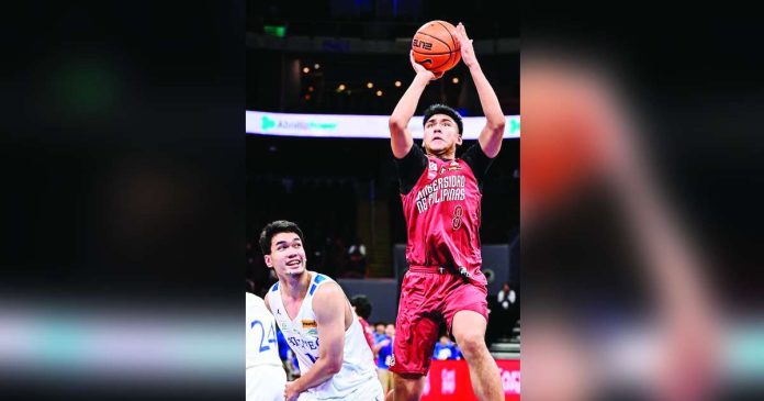 University of the Philippines Fighting Maroons’ Jacob Bayla pulls up for a basket. UAAP PHOTO