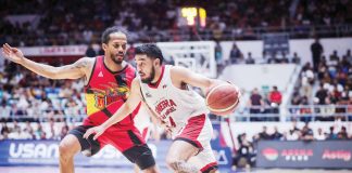 Barangay Ginebra San Miguel Kings’ Rhon Jhay Abarrientos attacks the defense of San Miguel Beermen’s Chris Ross. PBA PHOTO