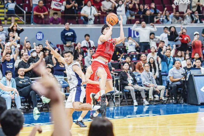 University of the East Red Warriors’ Wello Lingolingo with his game-winning basket. UAAP PHOTO