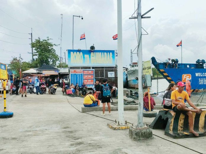 Private vehicles and trucks bound for Guimaras were stranded at the roll-on/roll-off port in Iloilo City after the Philippine Coast Guard suspended all maritime operations on Wednesday, Oct. 23, 2024, due to Tropical Storm Kristine. AJ PALCULLO/PN