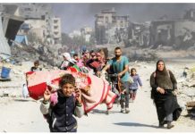 Displaced Palestinians make their way in Gaza City after fleeing northern Gaza amid an Israeli ground offensive. As many as 130,000 Palestinians have been displaced by an Israeli ground offensive in northern Gaza since October. REUTERS