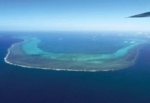 This photo taken on February 15, 2024, shows an aerial view of the Scarborough Shoal in the West Philippine Sea. Photo by JAM STA ROSA / AFP