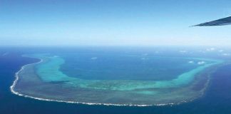 This photo taken on February 15, 2024, shows an aerial view of the Scarborough Shoal in the West Philippine Sea. Photo by JAM STA ROSA / AFP