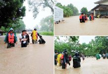 Local government personnel rescue residents in various barangays in Libon town, Albay province who were severely affected by massive flooding brought about by Tropical Storm Kristine on Oct. 22, 2024. PNA