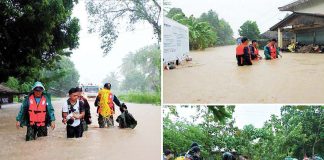 Local government personnel rescue residents in various barangays in Libon town, Albay province who were severely affected by massive flooding brought about by Tropical Storm Kristine on Oct. 22, 2024. PNA