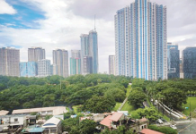 The skyline and business district of Bonifacio Global City in Taguig City are photographed on a clear Friday afternoon on Oct. 4, 2024. S&P Global Ratings said on Tuesday, Nov. 26, 2024, raised the Philippine credit ratings outlook to positive, citing the country's strong growth economic potential. PNA PHOTO BY JOAN BONDOC