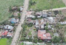 Damaged houses dot the national highway in Northern Iloilo after super typhoon Yolanda struck on November 8, 2013. Yolanda (international name: Haiyan) is considered one of the most destructive typhoons in history. PN