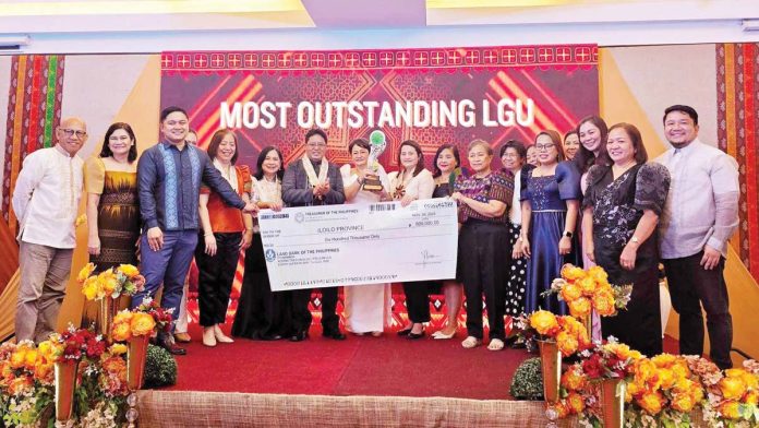 Iloilo Province’s Most Outstanding Local Government Unit (LGU) award for improved health outcomes and robust local health systems from the Department of Health (DOH) - Western Visayas is being received by Iloilo Provincial Health Office (IPHO) head Dr. Maria Socorro Colmenares- Quiñon, Provincial Health Officer I Dr. Wendel Tupas-Marcelo, Dr. Rodney Labis of IPHO’s Health Service Delivery Division, and League of Municipalities of the Philippines (LMP) – Iloilo Chapter president Mayor Rosario Mediatrix Fernandez of San Enrique town. PHOTO FROM DR. WENDEL TUPAS MARCELO FACEBOOK PAGE