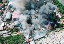 Forty-six houses were completely destroyed and two more were partially damaged in a fire in Barangay San Pedro, Molo, Iloilo on Thursday, Nov. 21. This aerial photo shows the area hit by fire. MORE POWER PHOTO