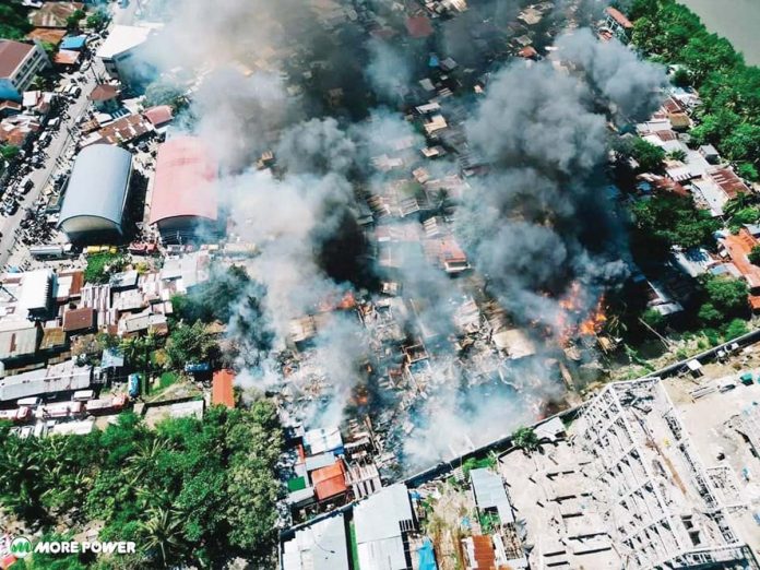 Forty-six houses were completely destroyed and two more were partially damaged in a fire in Barangay San Pedro, Molo, Iloilo on Thursday, Nov. 21. This aerial photo shows the area hit by fire. MORE POWER PHOTO