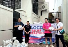 Philippine Amusement and Gaming Corporation’s Asst. VP for Community Relations and Services Eric Balcos (extreme left) and Senior Manager Rydel de Guzman (extreme right) turned over 3,000 relief packs to former Vice President Leni Robredo’s Angat Buhay Foundation in Quezon City. The relief goods were distributed to affected residents in Naga City, which suffered devastating flash floods after the Bicol River overflowed due to heavy rains.